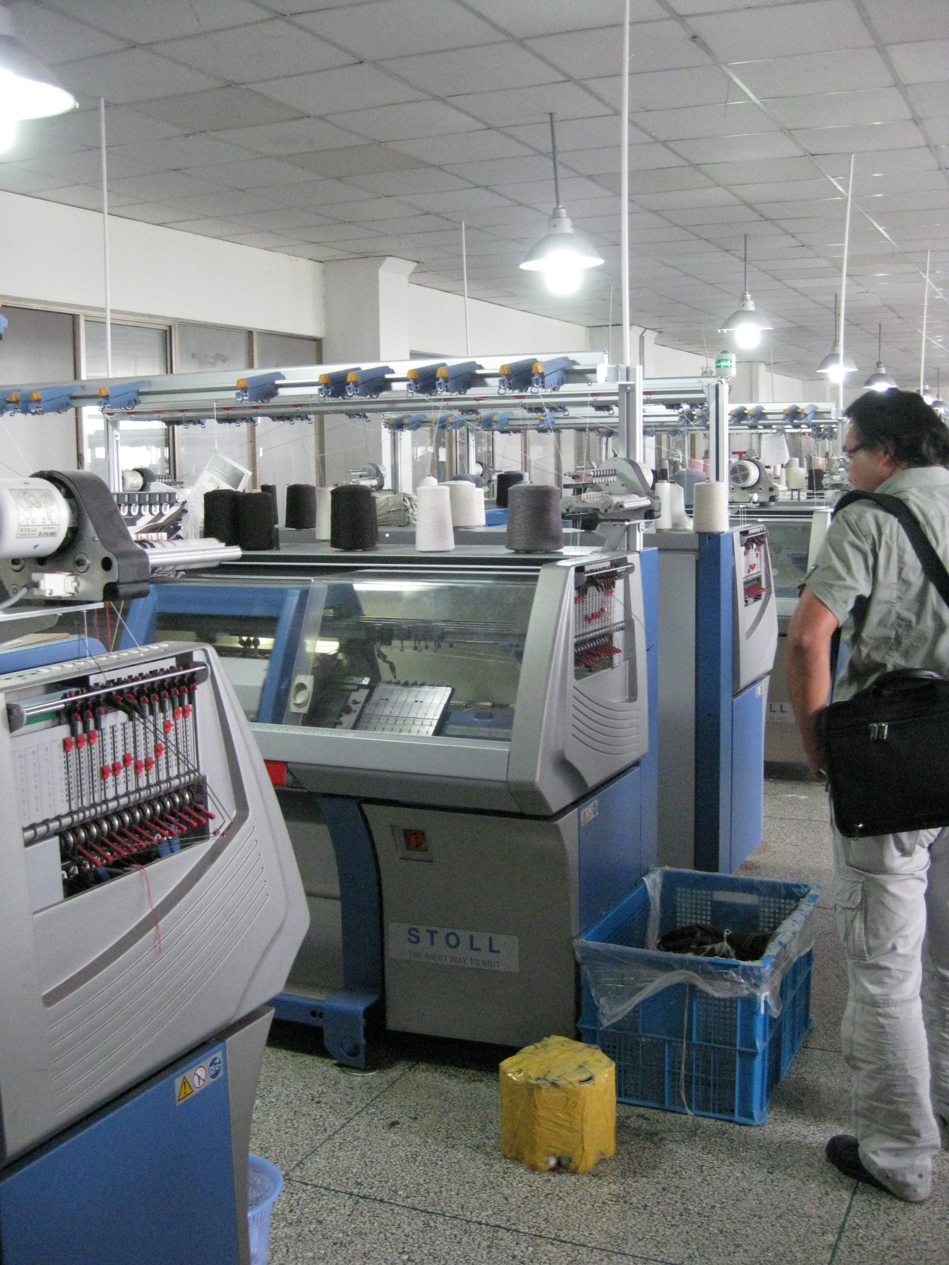 flat bed knitting machines in a cashmere factory 